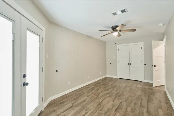 a view of an empty room with a window