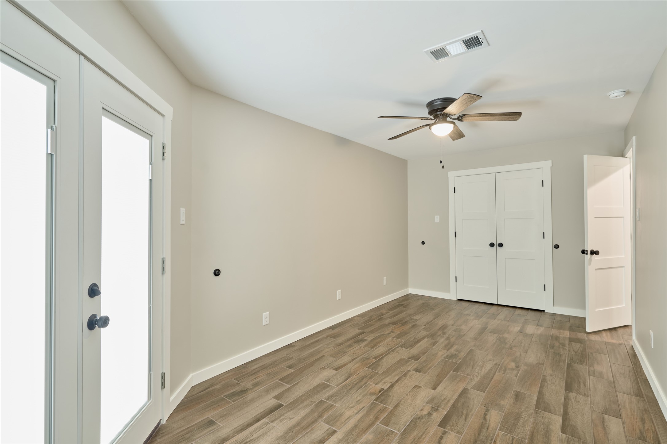 1014 Graham Drive, Unit L2 Tomball, TX 77375 - Photo 25 of 30 HUGE walk in closet with double doors