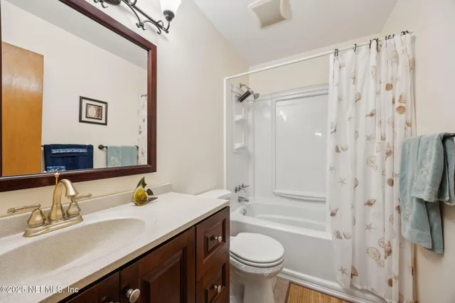 a view of a garage with a table and chairs