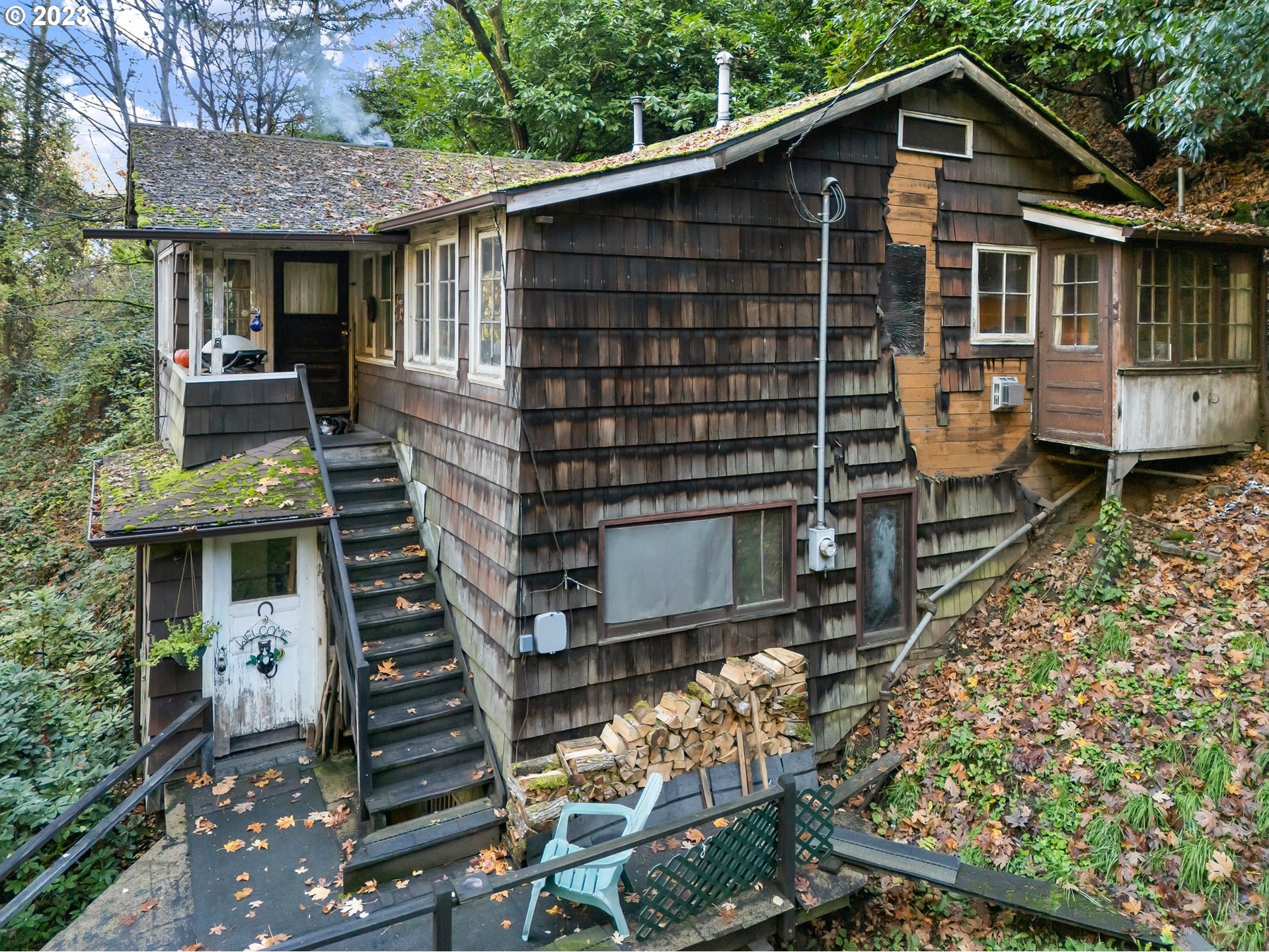 3852 Southwest Condor Avenue Portland, OR 97239 - Photo 12 of 44 a front view of a house with a yard