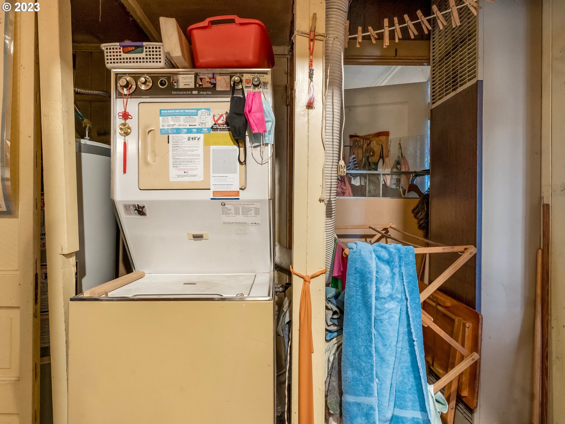 3852 Southwest Condor Avenue Portland, OR 97239 - Photo 22 of 44 a utility room with dryer and washer