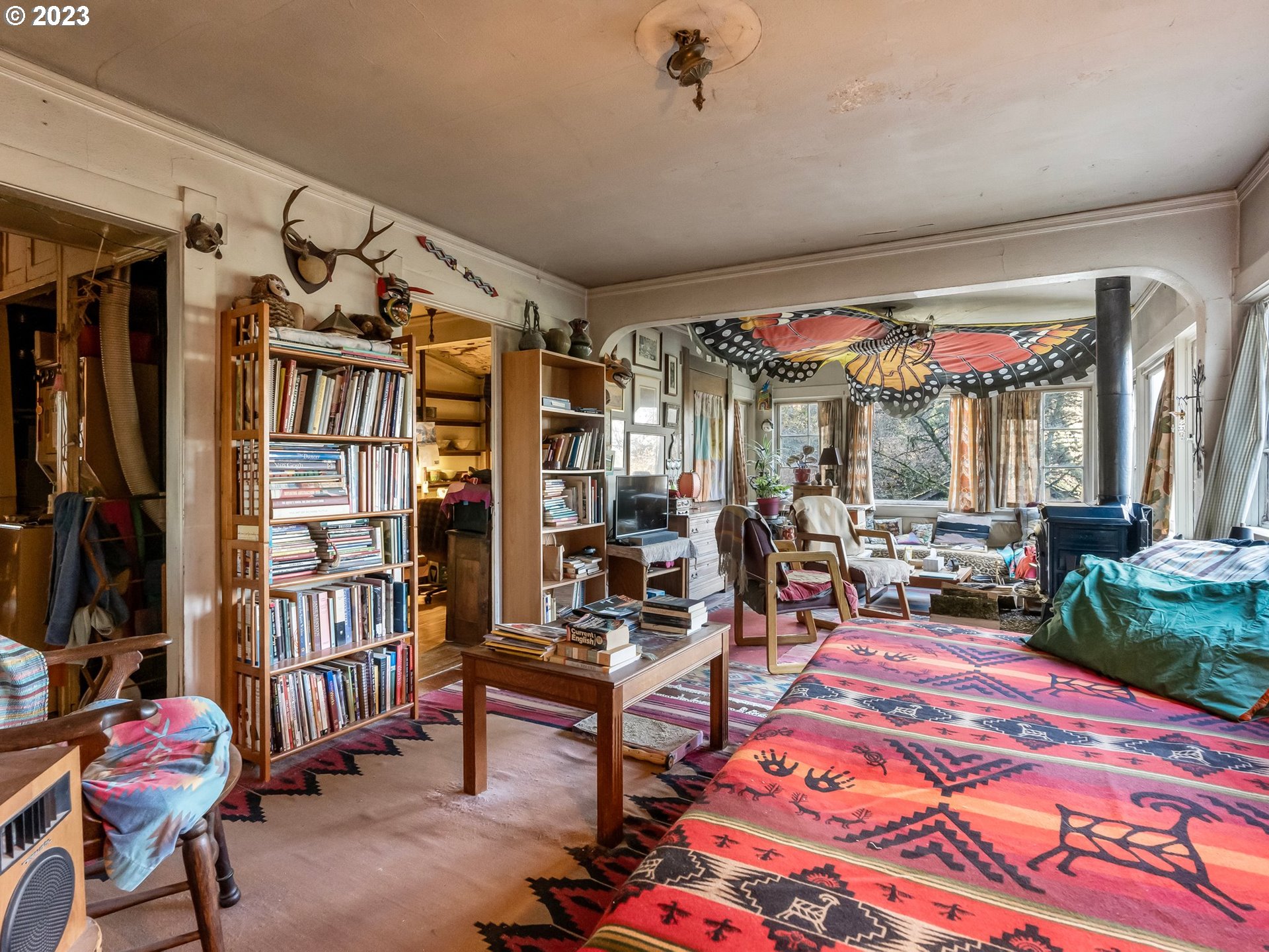 3852 Southwest Condor Avenue Portland, OR 97239 - Photo 25 of 44 a living room with lots of furniture and a rug