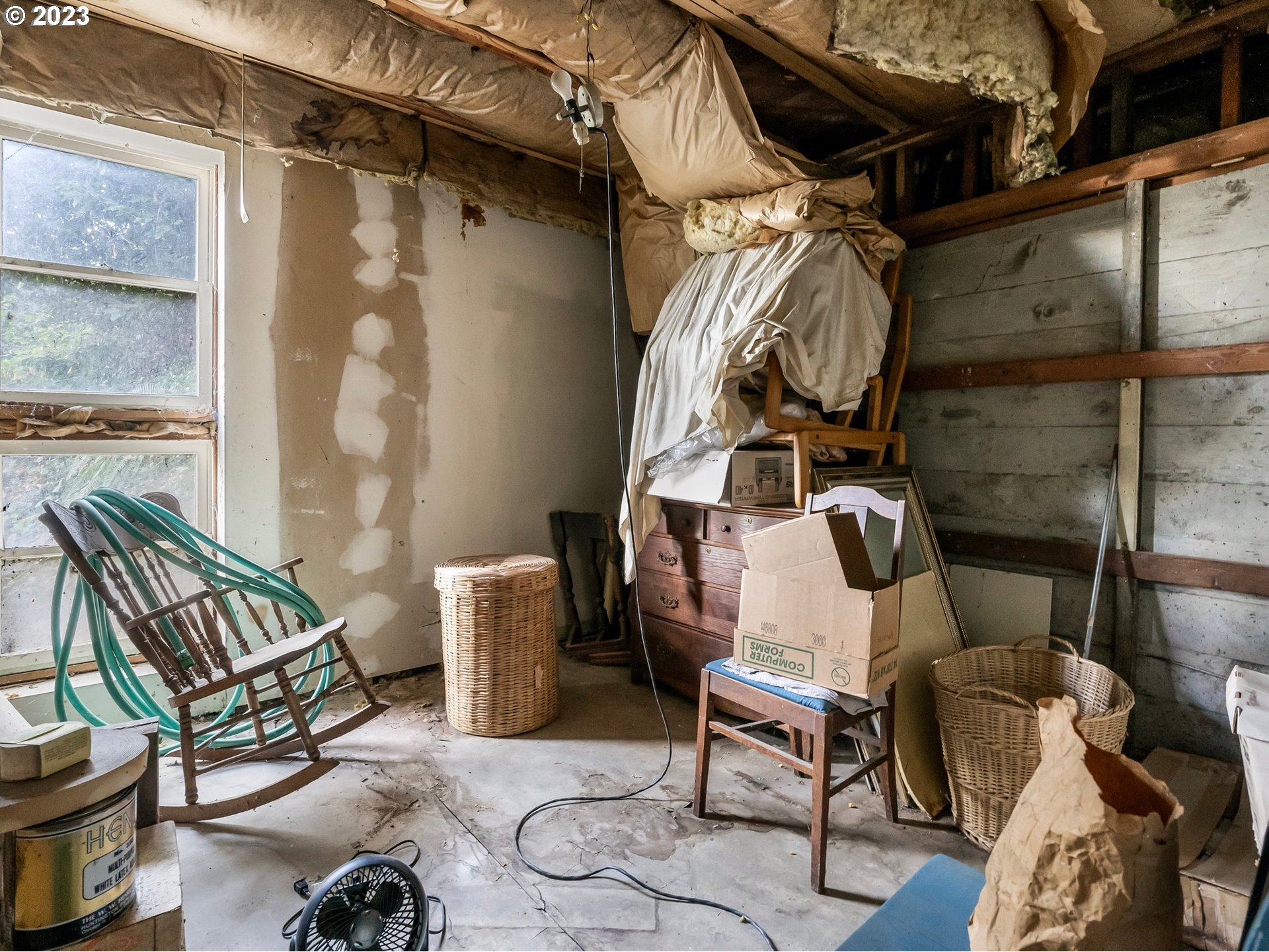 3852 Southwest Condor Avenue Portland, OR 97239 - Photo 35 of 44 a view of walk in closet with clothes and shoes