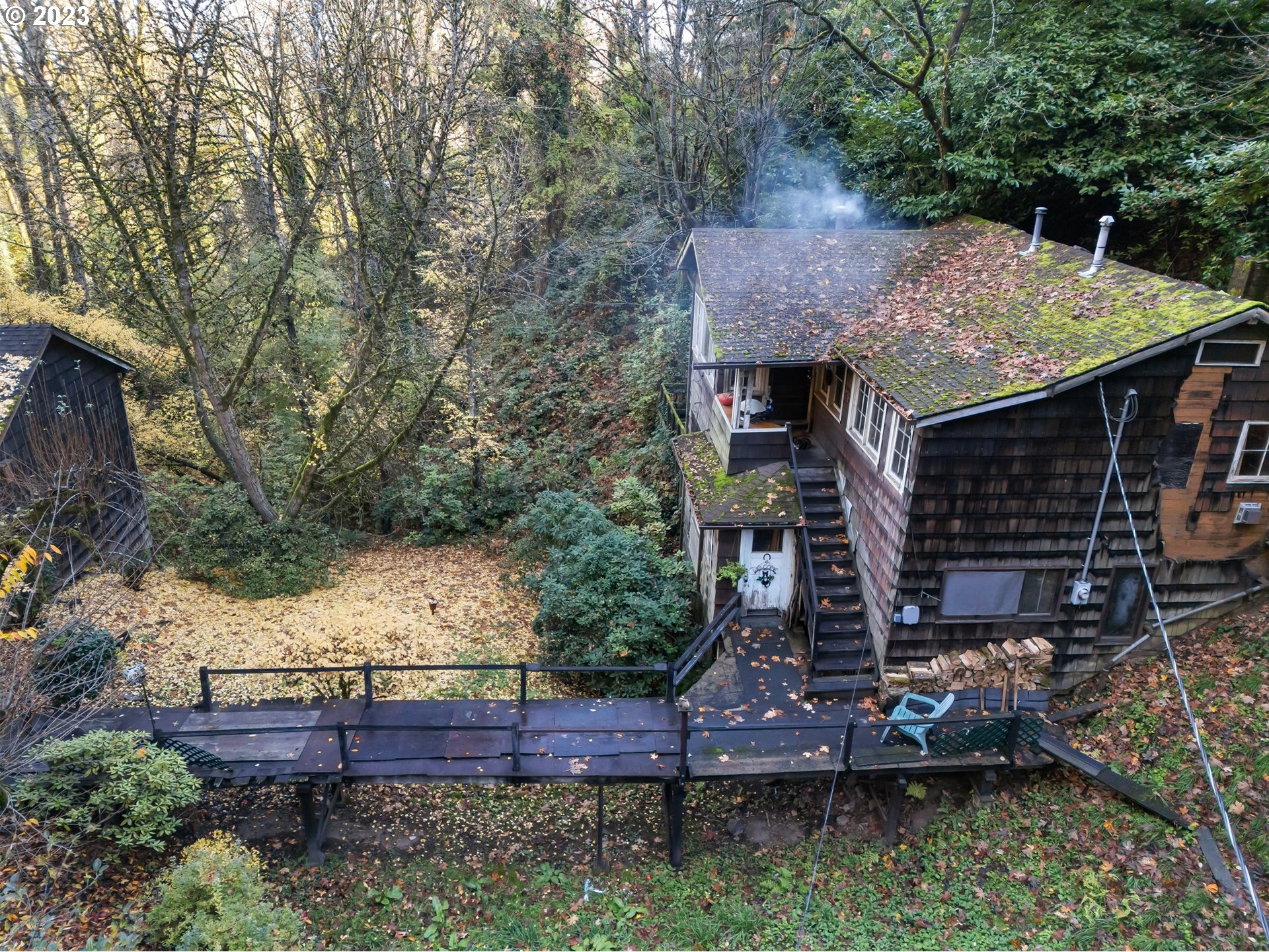 3852 Southwest Condor Avenue Portland, OR 97239 - Photo 36 of 44 aerial view of a house with a yard