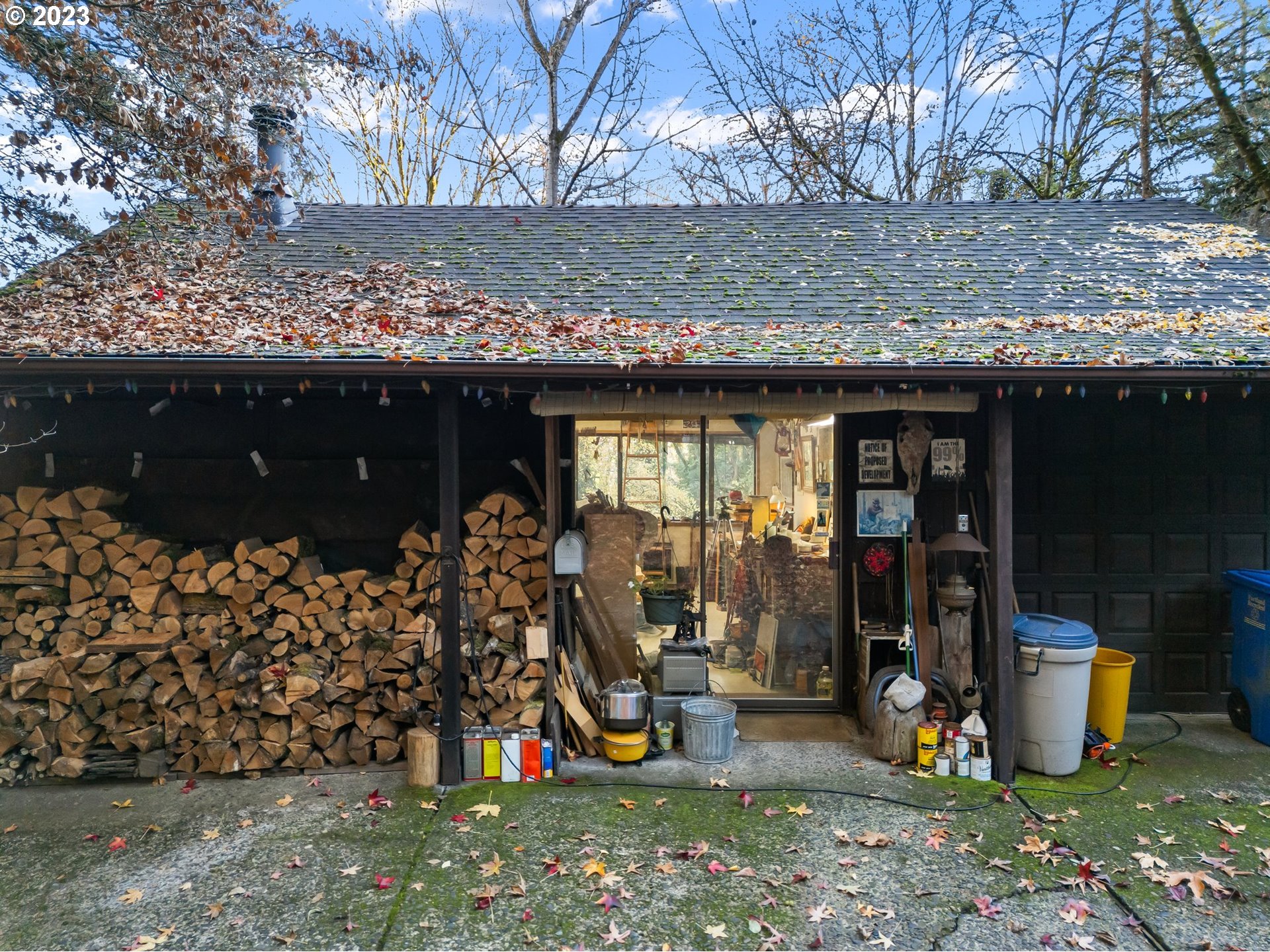 3852 Southwest Condor Avenue Portland, OR 97239 - Photo 40 of 44 a view of a wooden house with a floor and a tree