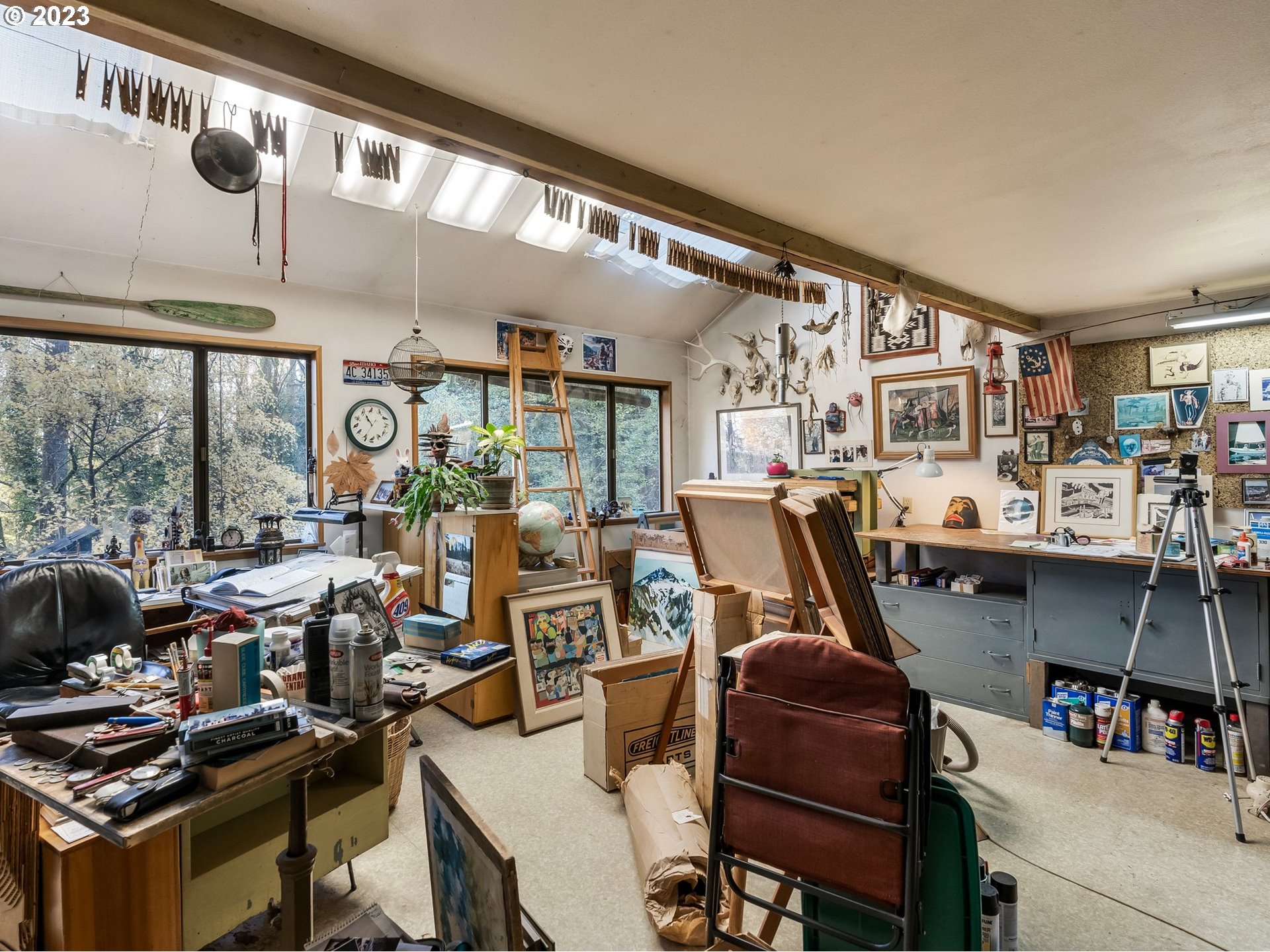 3852 Southwest Condor Avenue Portland, OR 97239 - Photo 43 of 44 a living room with lots of furniture and a large window
