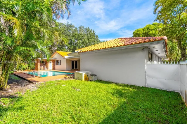 a view of a swimming pool with an outdoor space