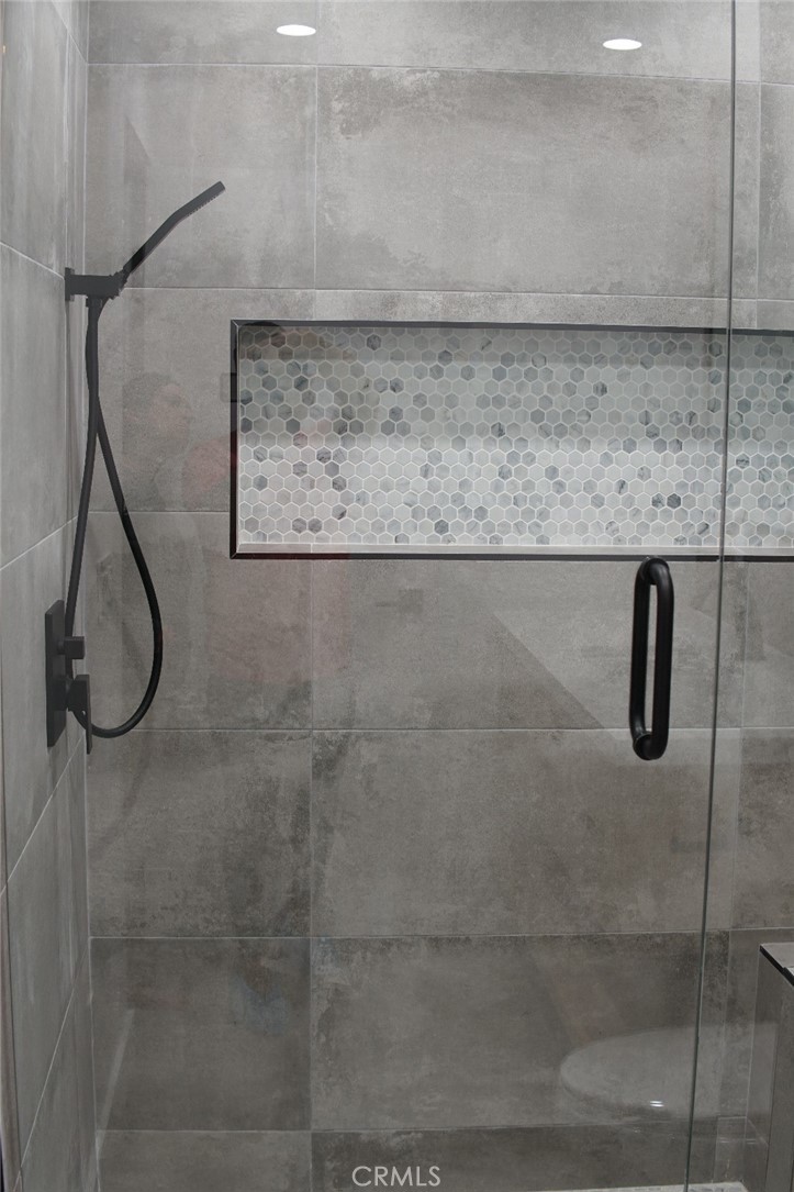 7127 Forest Hills Road West Hills, CA 91307 - Photo 19 of 37 a bathroom with a shower