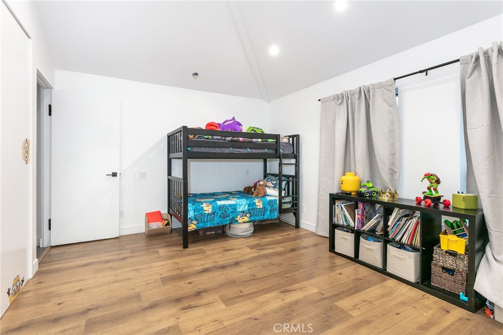 7127 Forest Hills Road West Hills, CA 91307 - Photo 20 of 37 a bedroom with furniture and a bed