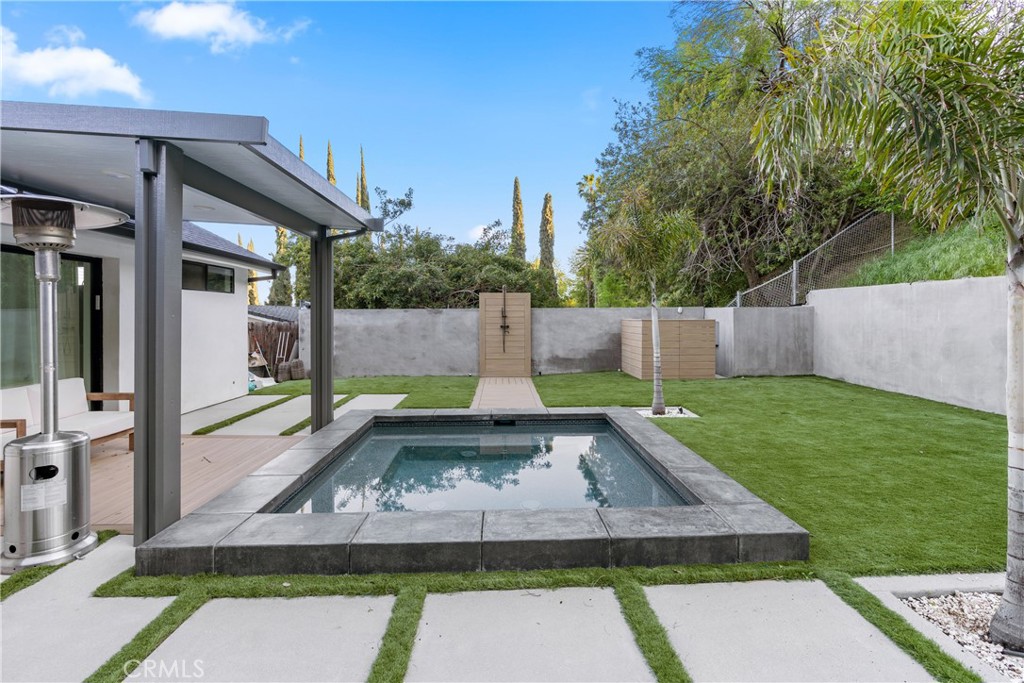 7127 Forest Hills Road West Hills, CA 91307 - Photo 27 of 37 a view of a backyard with a garden