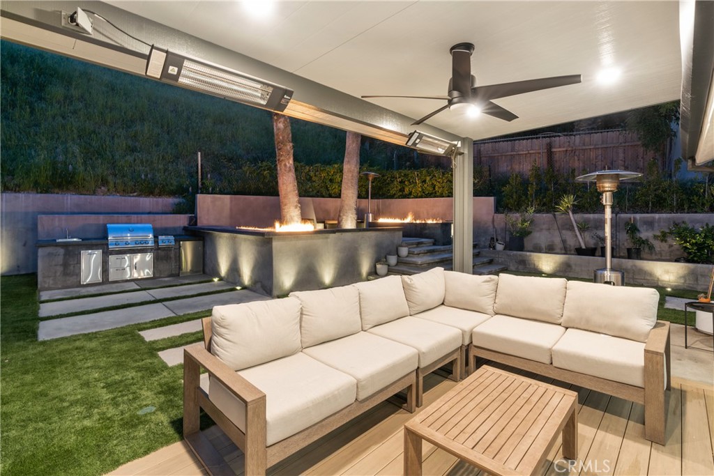 7127 Forest Hills Road West Hills, CA 91307 - Photo 33 of 37 a view of a patio with couches and a fire pit
