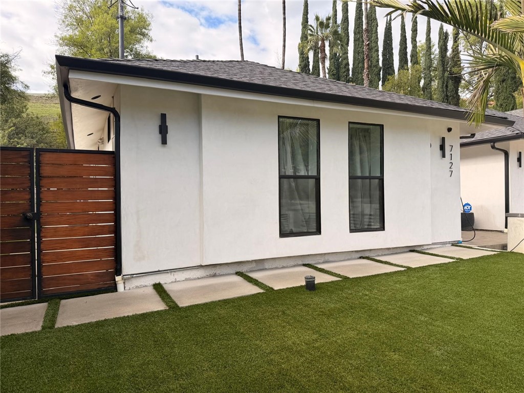 7127 Forest Hills Road West Hills, CA 91307 - Photo 4 of 37 a backyard of a house with lots of green space