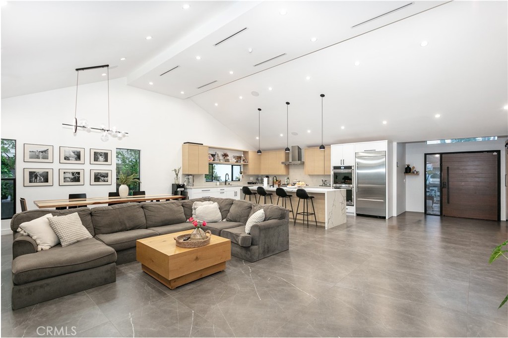 7127 Forest Hills Road West Hills, CA 91307 - Photo 7 of 37 a living room with furniture and kitchen view