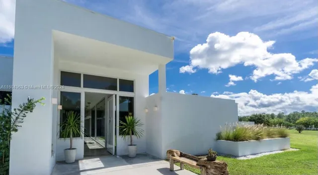 a house view with a garden space