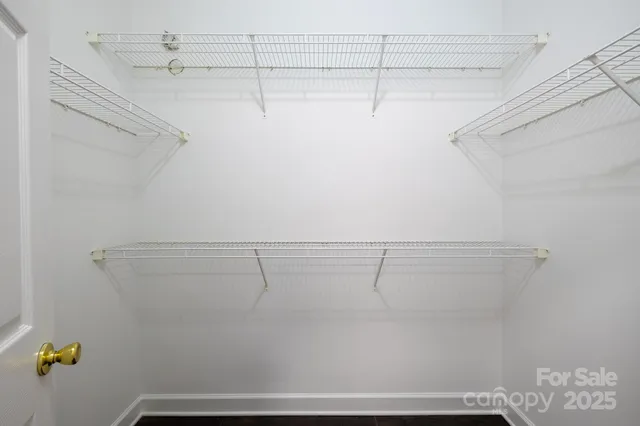 a view of a room with racks on the wall