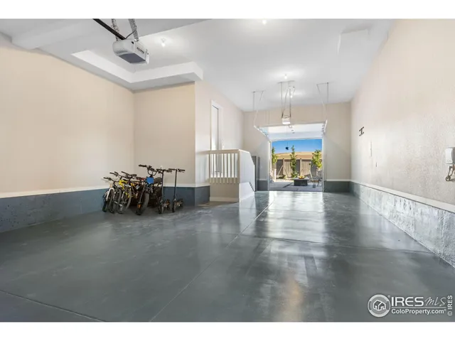 a view of a living room and chandelier