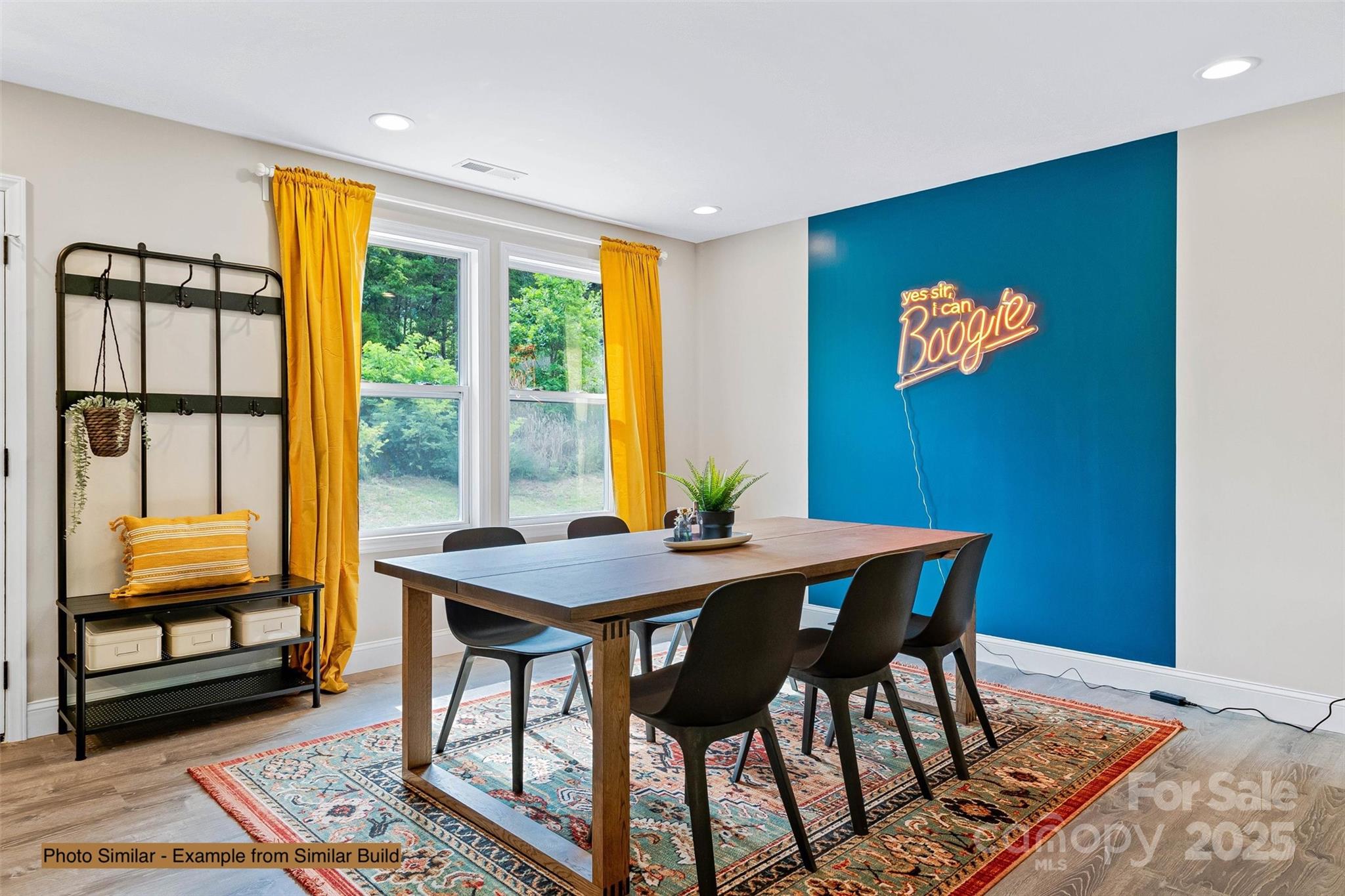 12 Holcombe Road Candler, NC 28715 - Photo 15 of 37 a view of a dining room with furniture and window
