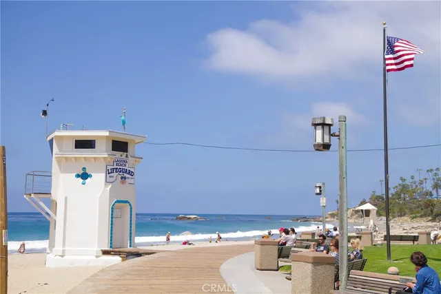 an aerial view of residential houses with a city view