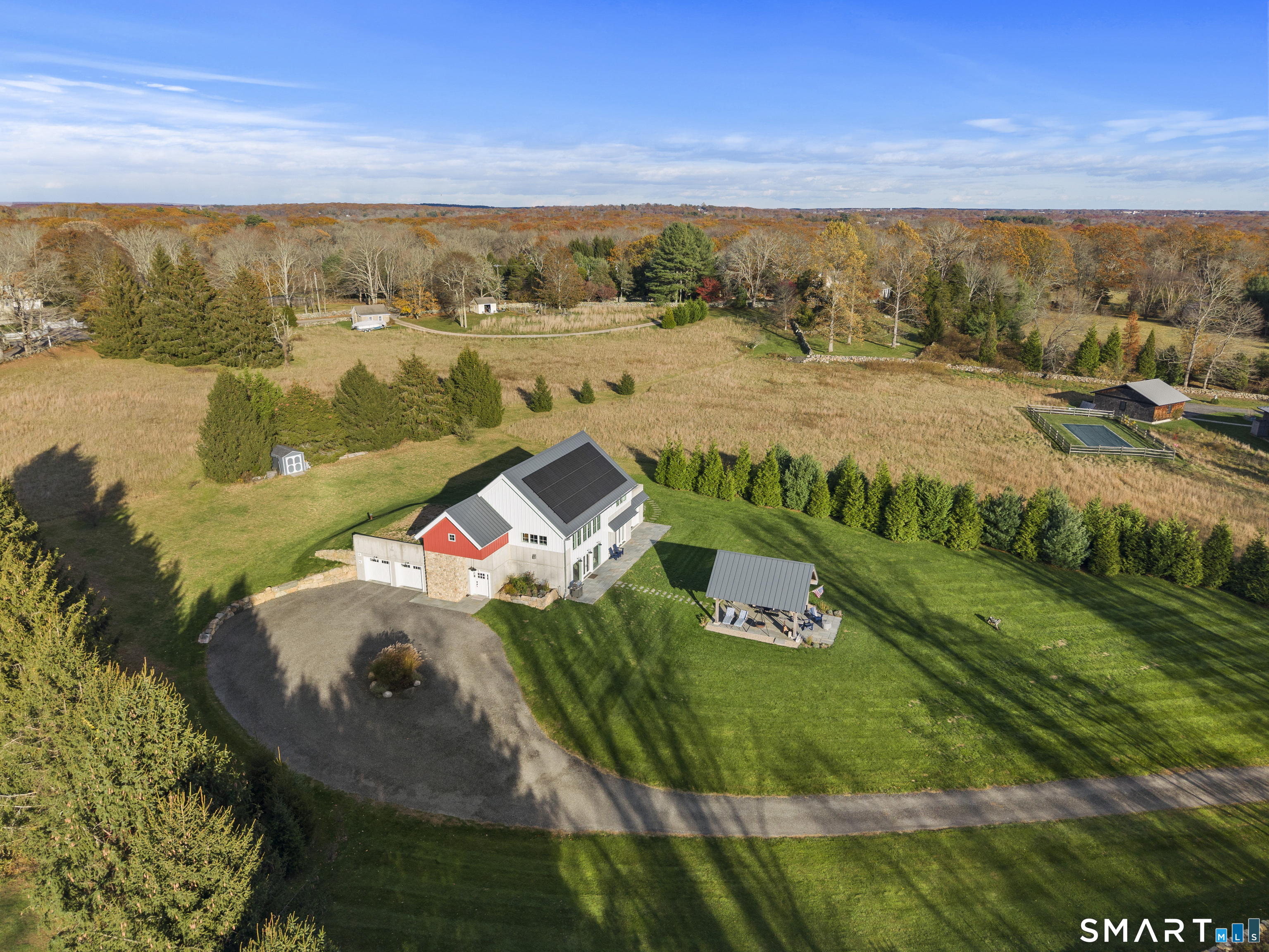 Paradise Found. Exquisite 3 Bedroom 2 and 1/2 Baths nestled on 7.3 Manicured Acres.