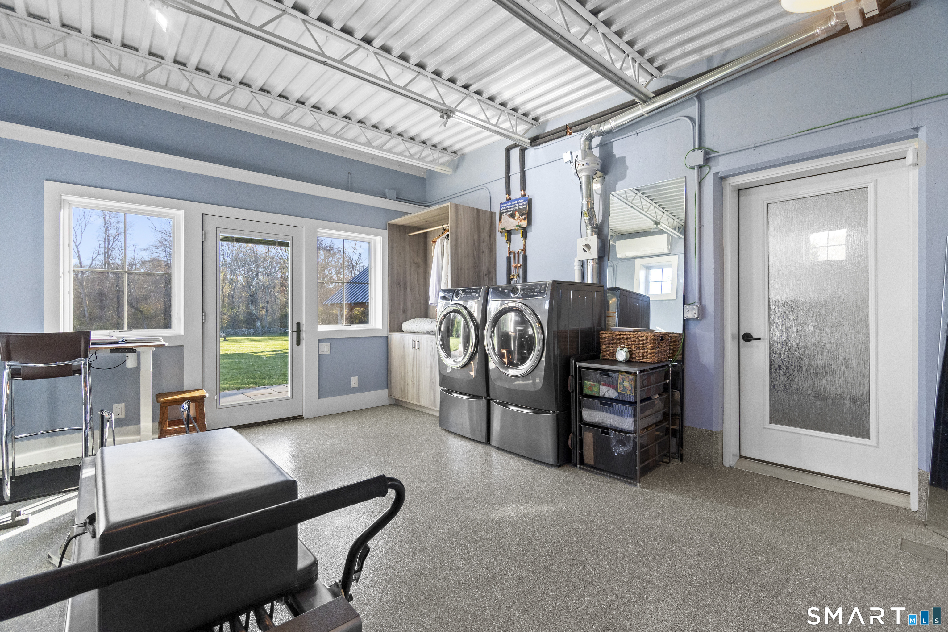 54 Barnes Road Stonington, CT 06378 - Photo 38 of 40 First Floor Exercise-Laundry Room on the First Floor adjacent to Primary Bedroom Suite. Many uses for this room.