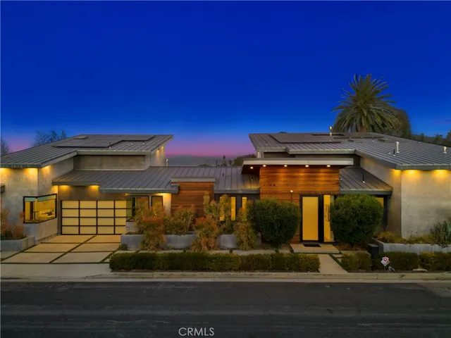a view of a house with a street