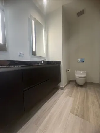 a bathroom with a sink and a toilet
