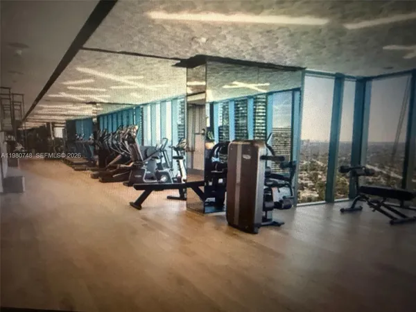 a view of a room with gym equipment