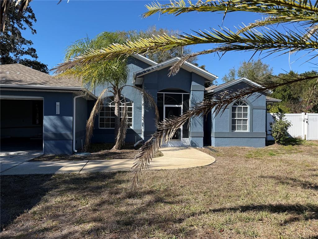 a view of a house with a patio