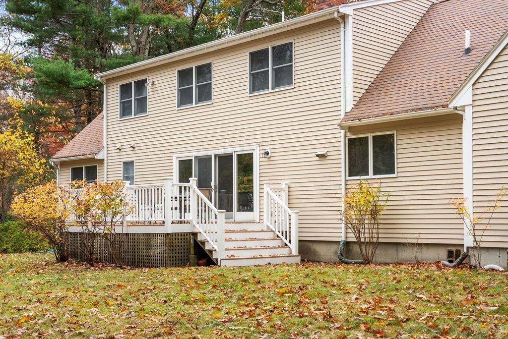 47 Ashcroft Road Sharon, MA 02067 - Photo 22 of 24 a front view of a house with garage