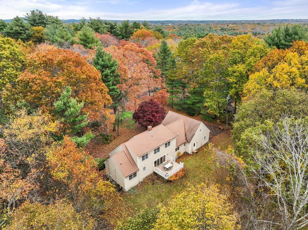 47 Ashcroft Road Sharon, MA 02067 - Photo 24 of 24 an aerial view of a house with a yard and lake view
