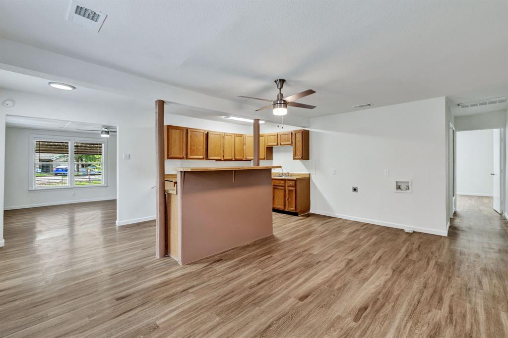 613 Cheyenne Road Dallas, TX 75217 - Photo 6 of 28 Open-concept living area featuring wood-finish flooring, recessed lighting, and a ceiling fan