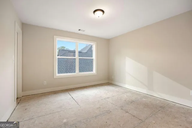 a bathroom with double sink and a mirror