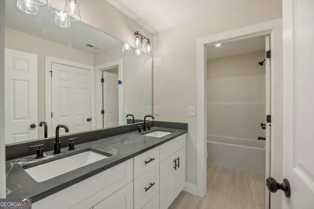 a bathroom with a shower and a toilet