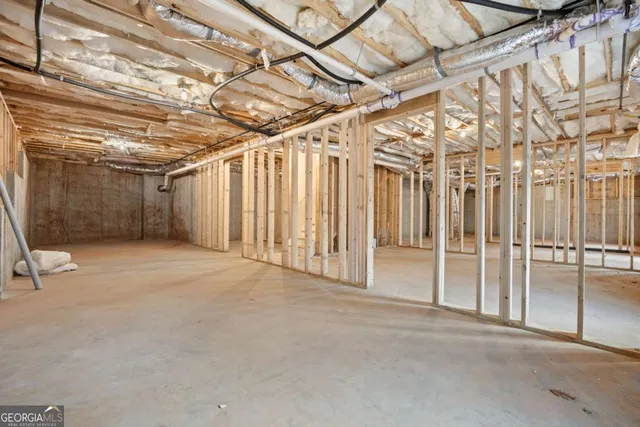 a view of a room with wooden walls
