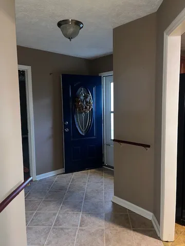 a view of a door and an empty space