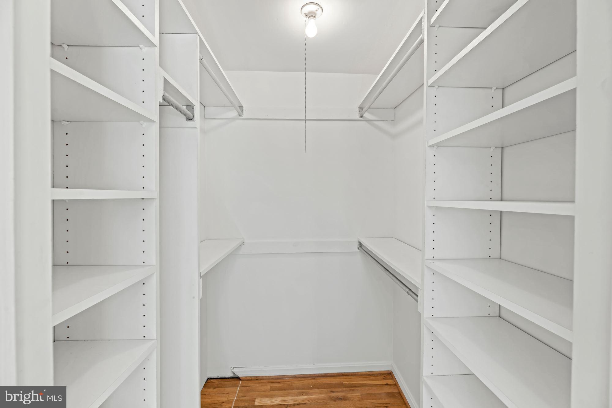 8434 Willow Forge Road Springfield, VA 22152 - Photo 27 of 55 Primary bedroom walk-in closet with shelving