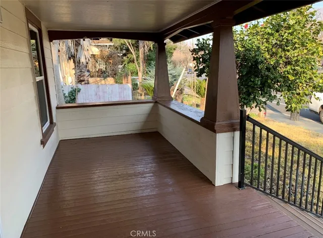 a view of a large window with wooden floor