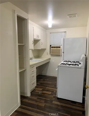 an empty room with a bathroom