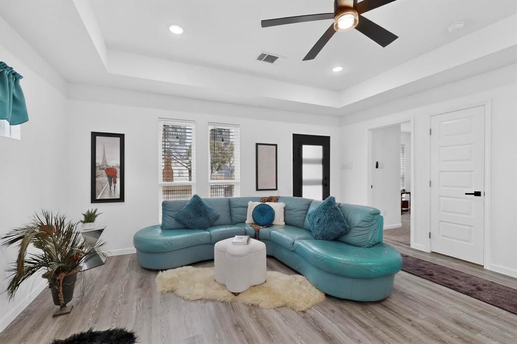 1202 Morrell Avenue Dallas, TX 75203 - Photo 6 of 33 a living room with furniture and a large window