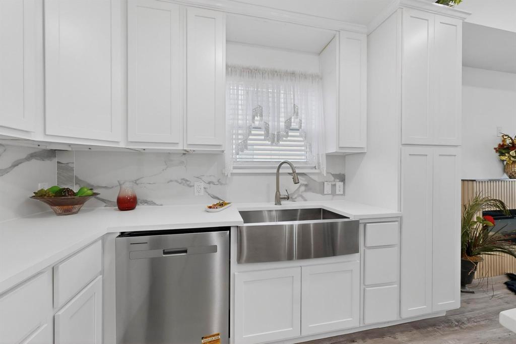 1202 Morrell Avenue Dallas, TX 75203 - Photo 10 of 33 a kitchen with a sink and cabinets