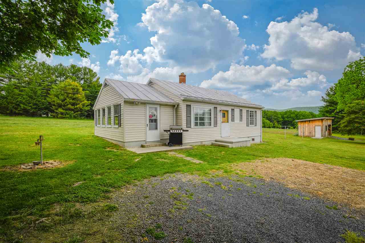 860 Fort Valley Road Fort Valley, VA 22652 - Photo 1 of 31 a view of a house with backyard porch and garden