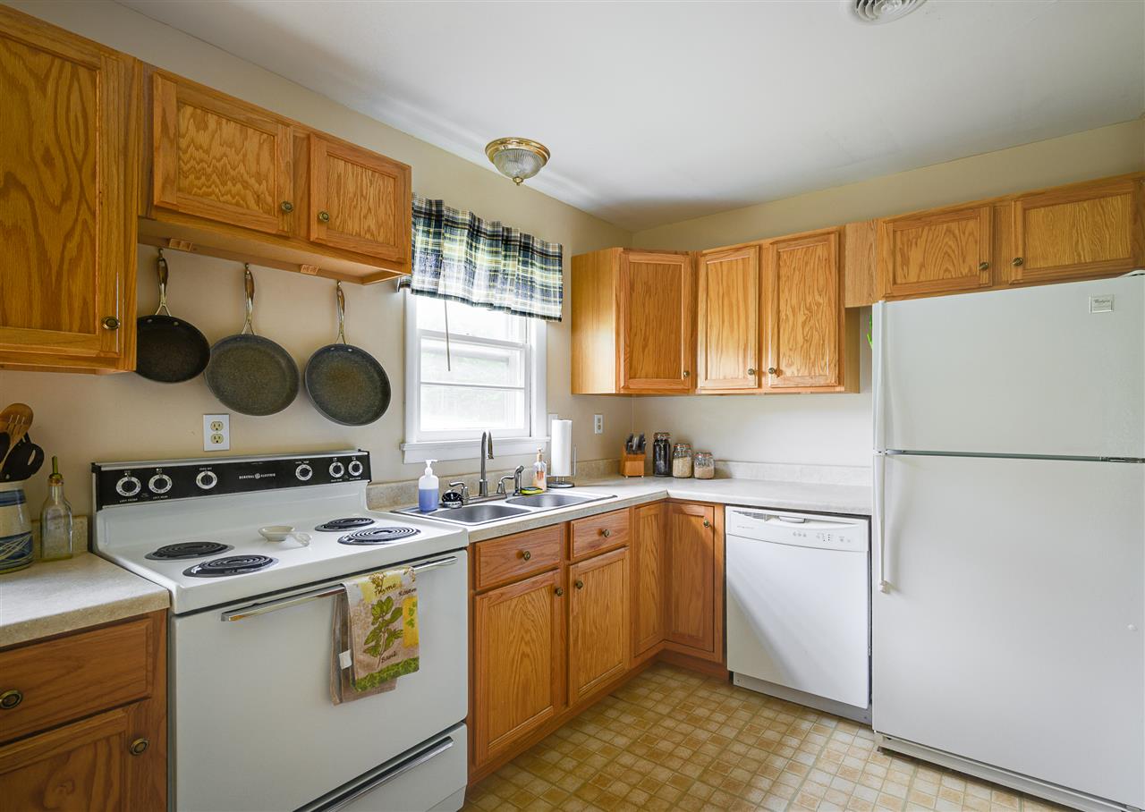 860 Fort Valley Road Fort Valley, VA 22652 - Photo 20 of 31 a kitchen with a sink a stove and cabinets