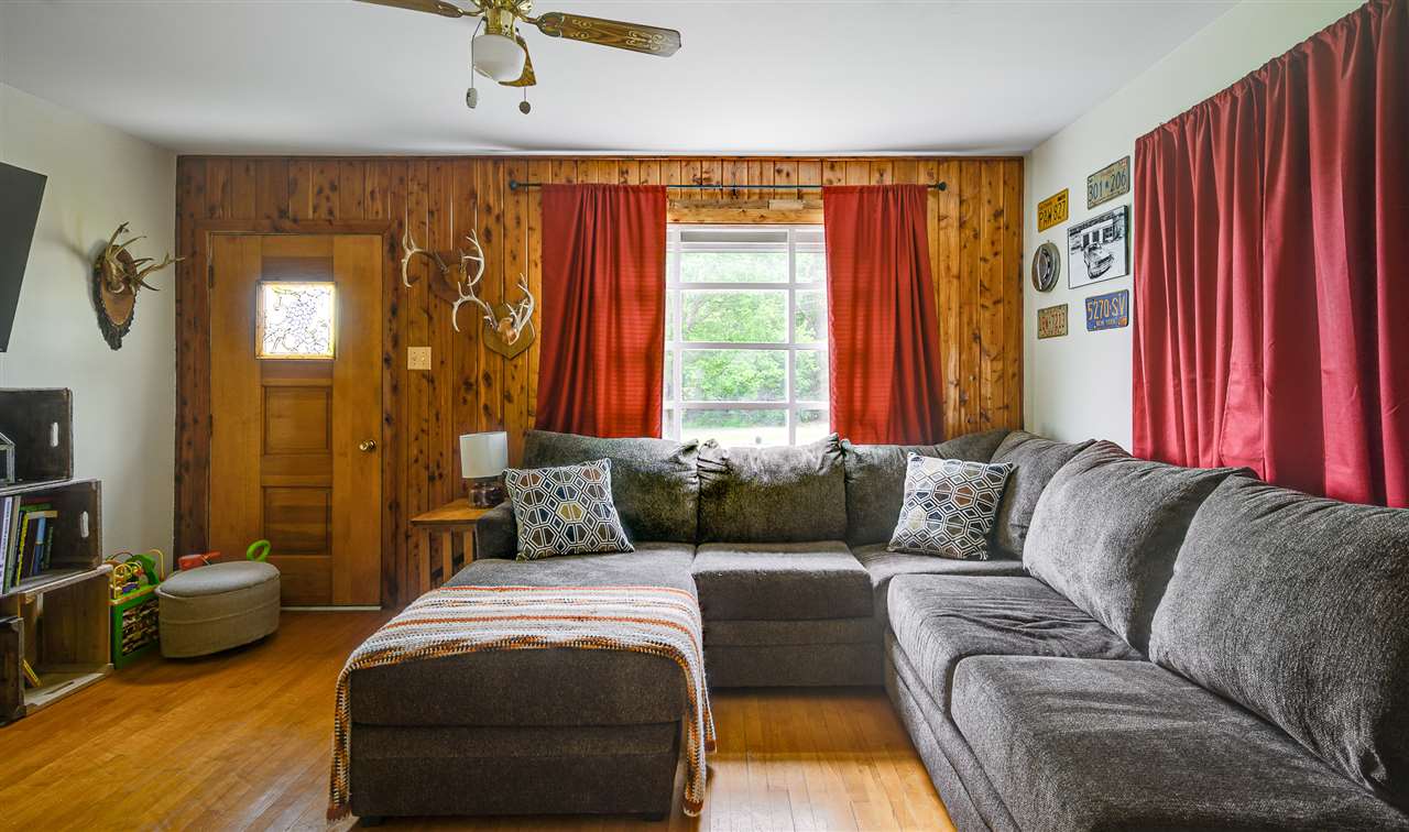 860 Fort Valley Road Fort Valley, VA 22652 - Photo 22 of 31 a living room with furniture and a large window
