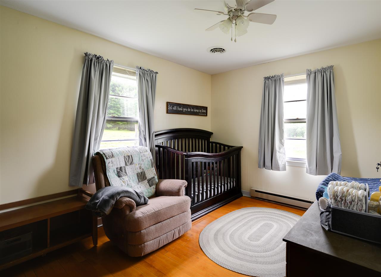 860 Fort Valley Road Fort Valley, VA 22652 - Photo 27 of 31 a bedroom with furniture and a window