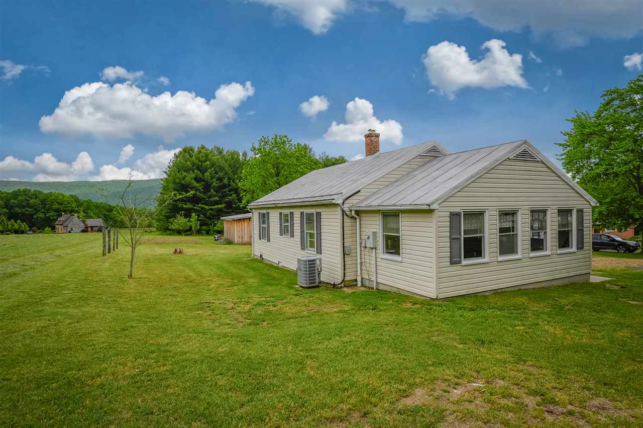 860 Fort Valley Road Fort Valley, VA 22652 - Photo 8 of 31 a view of a house with a backyard