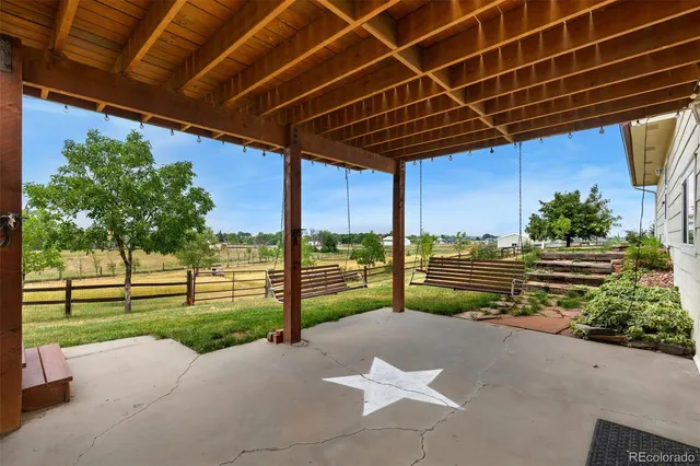 a view of backyard with deck