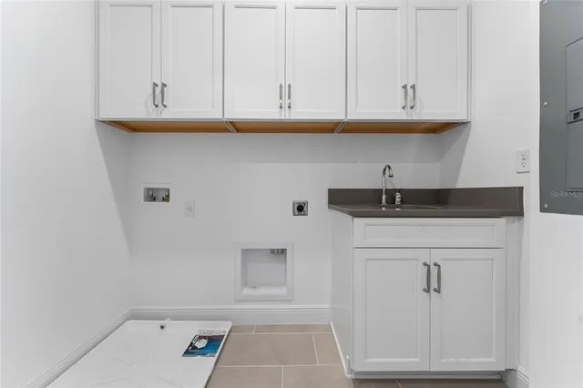 a view of an empty room with storage