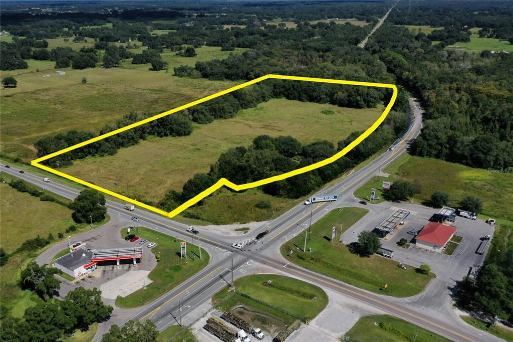 3070 State Road Webster, FL 33597 - Photo 4 of 10 an aerial view of a house