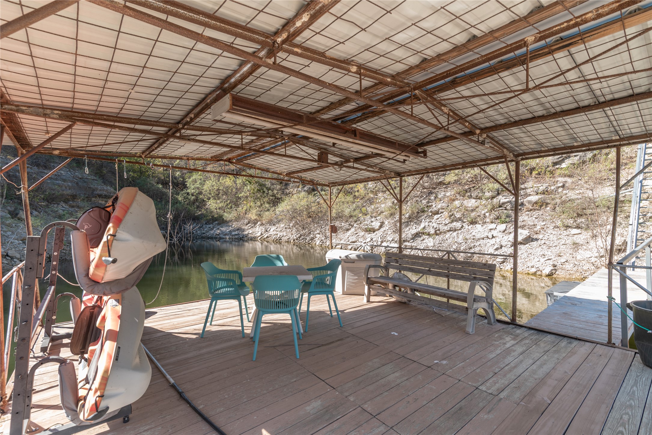 3807 Boat Dock Road Lago Vista, TX 78645 - Photo 26 of 37 A spacious covered dock with ample seating provides direct lake access.