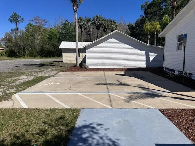 a view of a house with a street